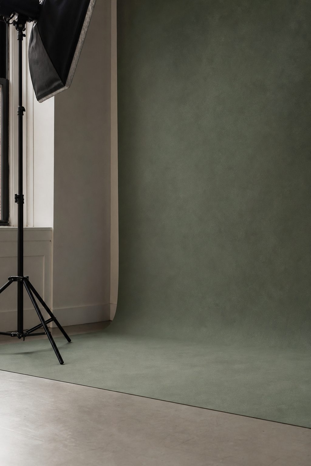 Seamless paper backdrop sweeping to the studio floor